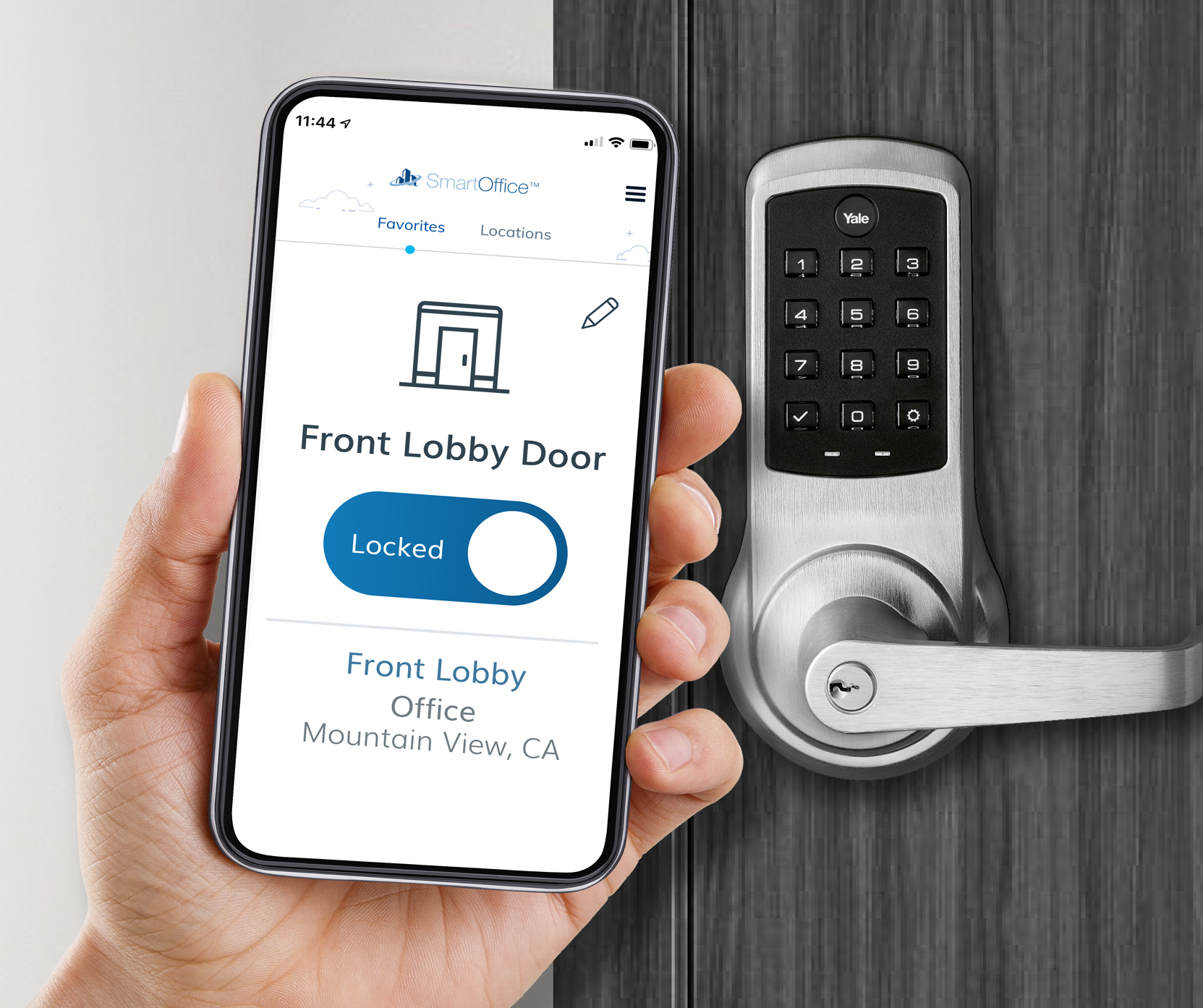 Hand holding a mobile phone with SmartOffice Access app in front of door with mag lock